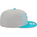 casquette-plate-grise-et-bleue-snapback-9fifty-draft-edition-2023-charlotte-hornets-nba-new-era