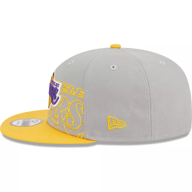 casquette-plate-grise-et-jaune-snapback-9fifty-draft-edition-2023-los-angeles-lakers-nba-new-era