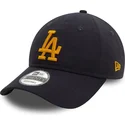 casquette-courbee-bleue-marine-ajustable-avec-logo-jaune-9twenty-league-essential-los-angeles-dodgers-mlb-new-era