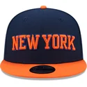 casquette-plate-bleue-marine-et-orange-snapback-9fifty-statement-new-york-knicks-nba-new-era