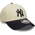 casquette-courbee-beige-et-bleue-marine-snapback-9forty-m-crown-new-york-yankees-mlb-new-era